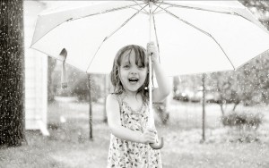 rain_baby_with_white_umbrella-wide